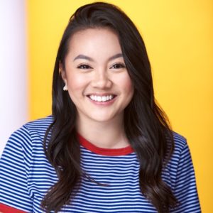 Smiling woman in striped shirt